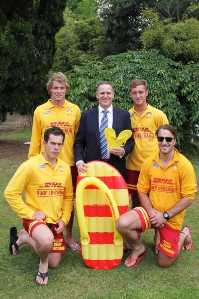 PM John Key with surf lifeguards.